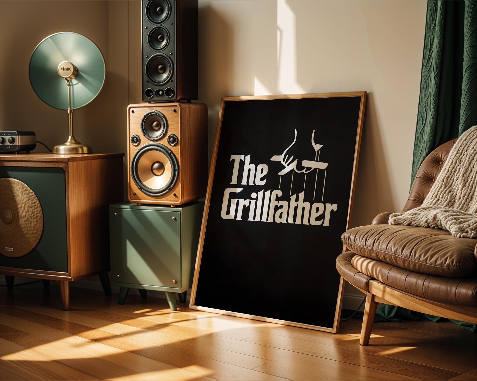 Bold black and white chalkboard-style poster with 'The Grillfather' text parodying The Godfather, complete with puppet strings holding a grilling fork. A perfect gift for dads, BBQ fans, and grill kings, this fun and graphic design adds flavor to backyard setups, man caves, or cookout spaces with a sense of humor.